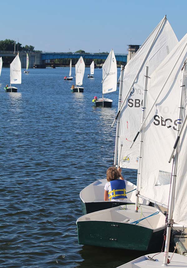 SBCSA sailboats in a row on the water